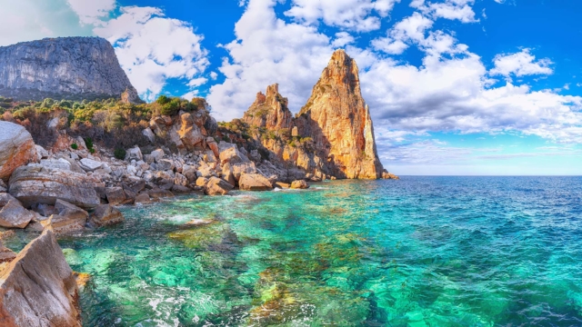 Rocks and blue green water