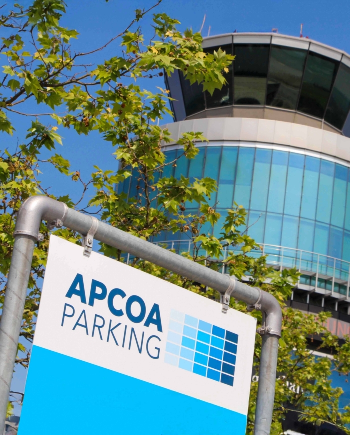 APCOA sign in front of the tower